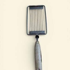 Marc Ecko Black and Brown Cheese Slicer